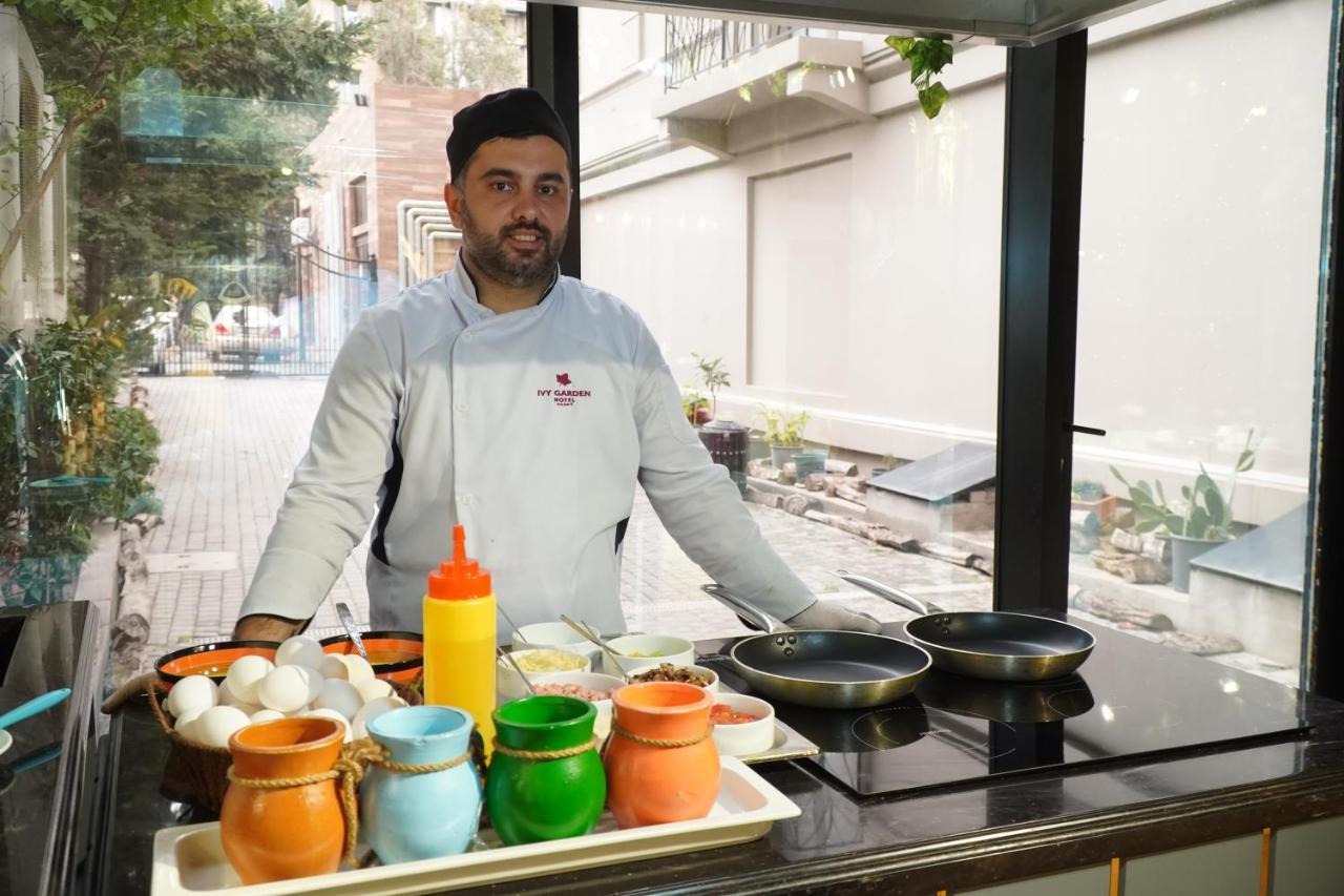 Ivy Garden Hotel Baku Exterior photo A street vendor in Athens, Greece
